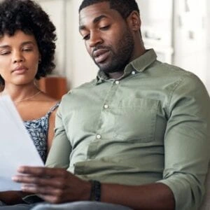 A couple looks at paperwork