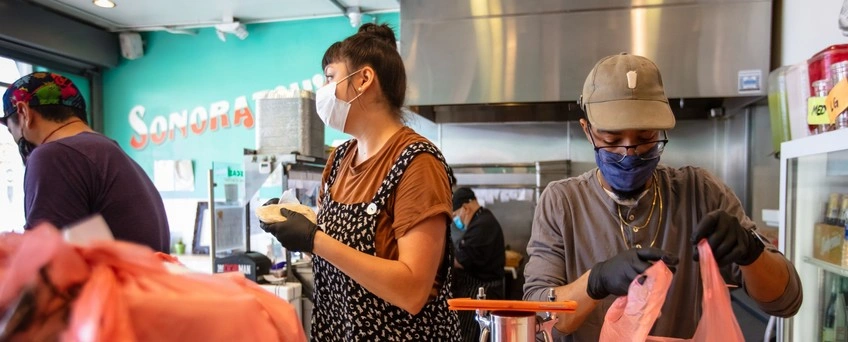 Debt Down, Credit Scores Up Year Into Pandemic