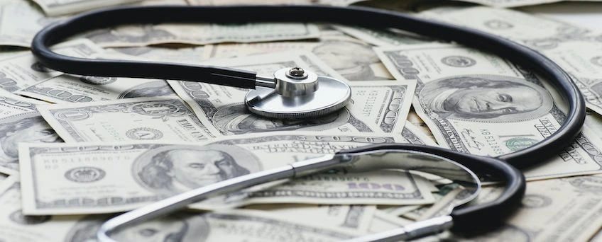 Survey: Americans Burdened With Medical Debt