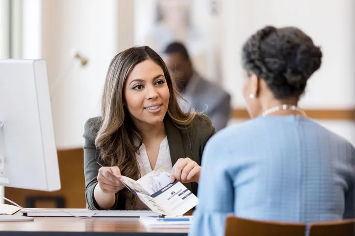 Loan officer going over paperwork